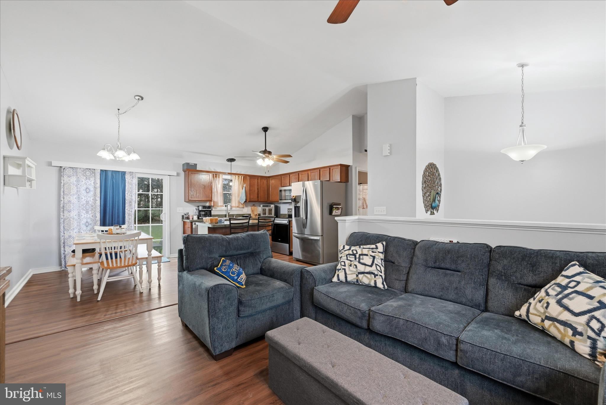 212 Freight Car Circle Inwood, WV 25428 - Photo 7 of 41 a living room with furniture and kitchen view