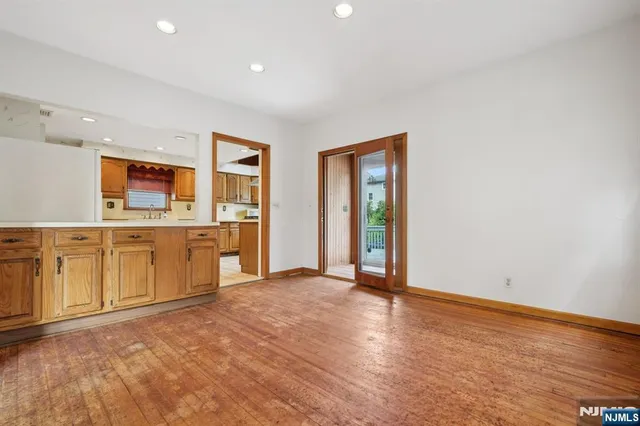 a view of a kitchen with a sink dishwasher and a microwave