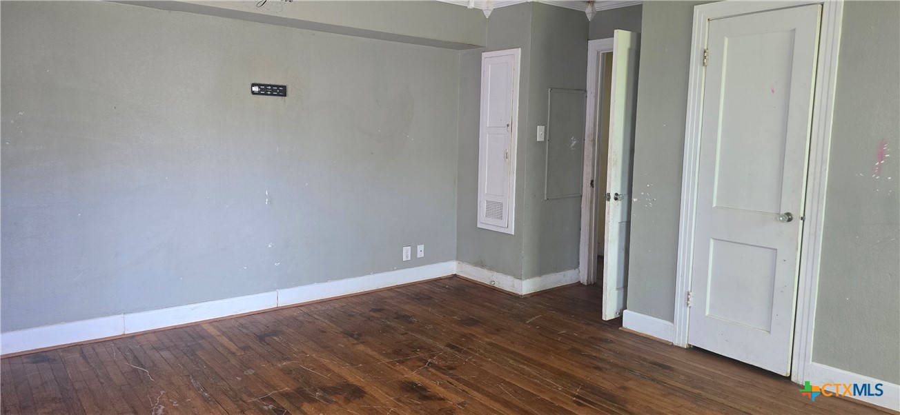 2001 East Forrest Street Victoria, TX 77901 - Photo 15 of 16 wooden floor in an empty room