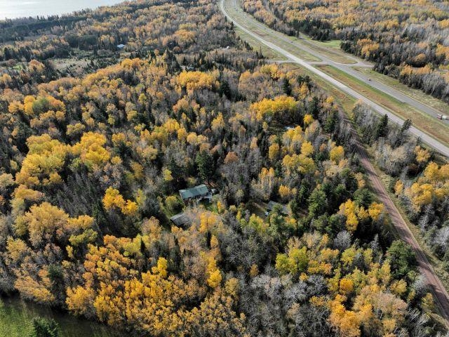 1302 Old North Shore Road Duluth, MN 55804 - Photo 17 of 75 Aerial view of property's location featuring a forest