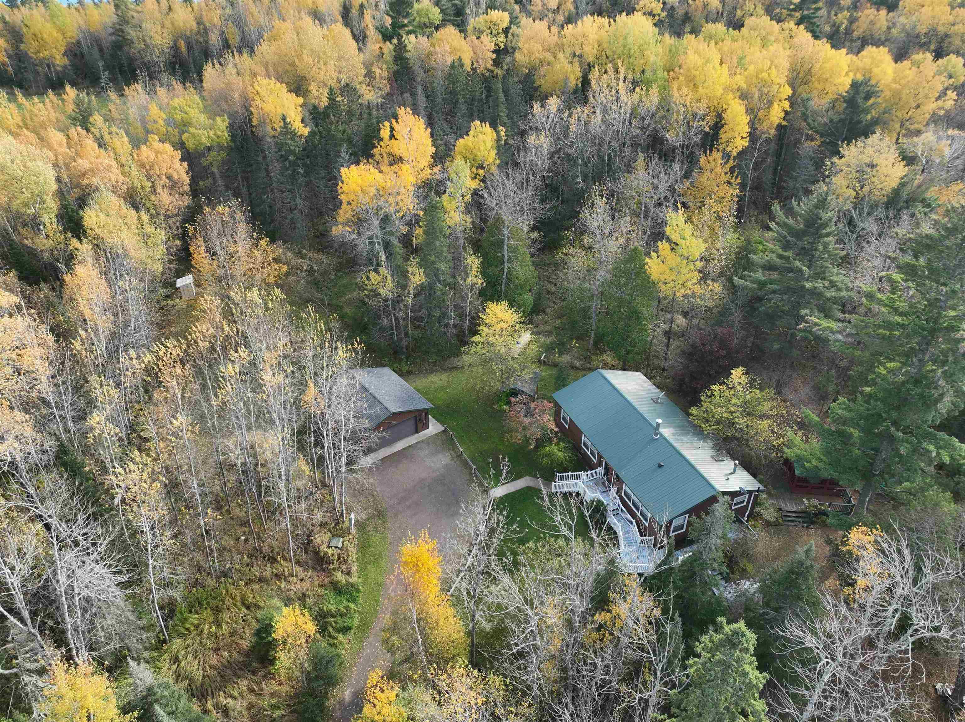 1302 Old North Shore Road Duluth, MN 55804 - Photo 26 of 75 Aerial overview of property's location featuring a forest