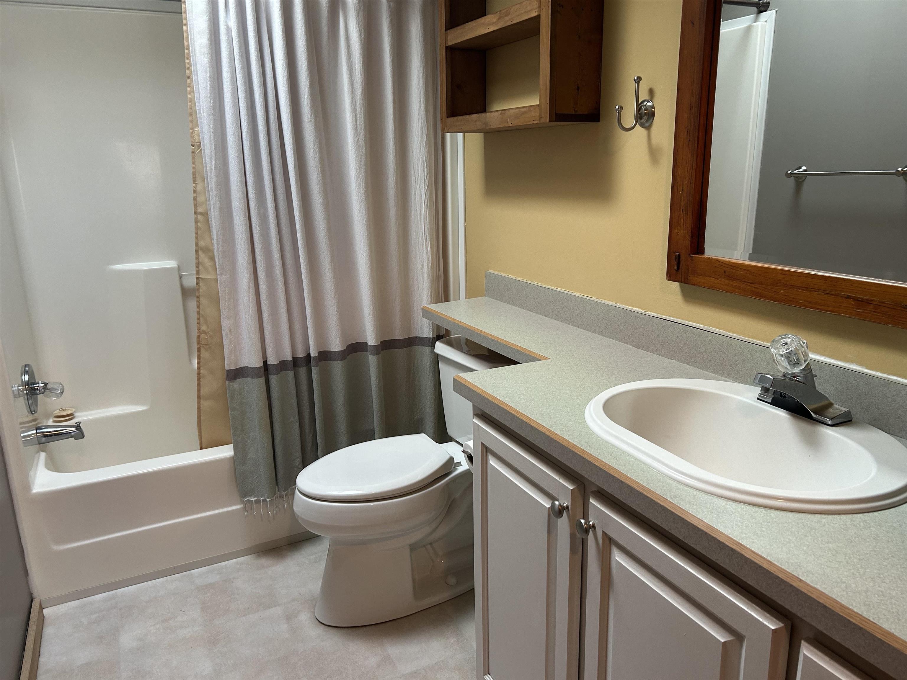 1302 Old North Shore Road Duluth, MN 55804 - Photo 63 of 75 Bathroom with vanity and shower / tub combo