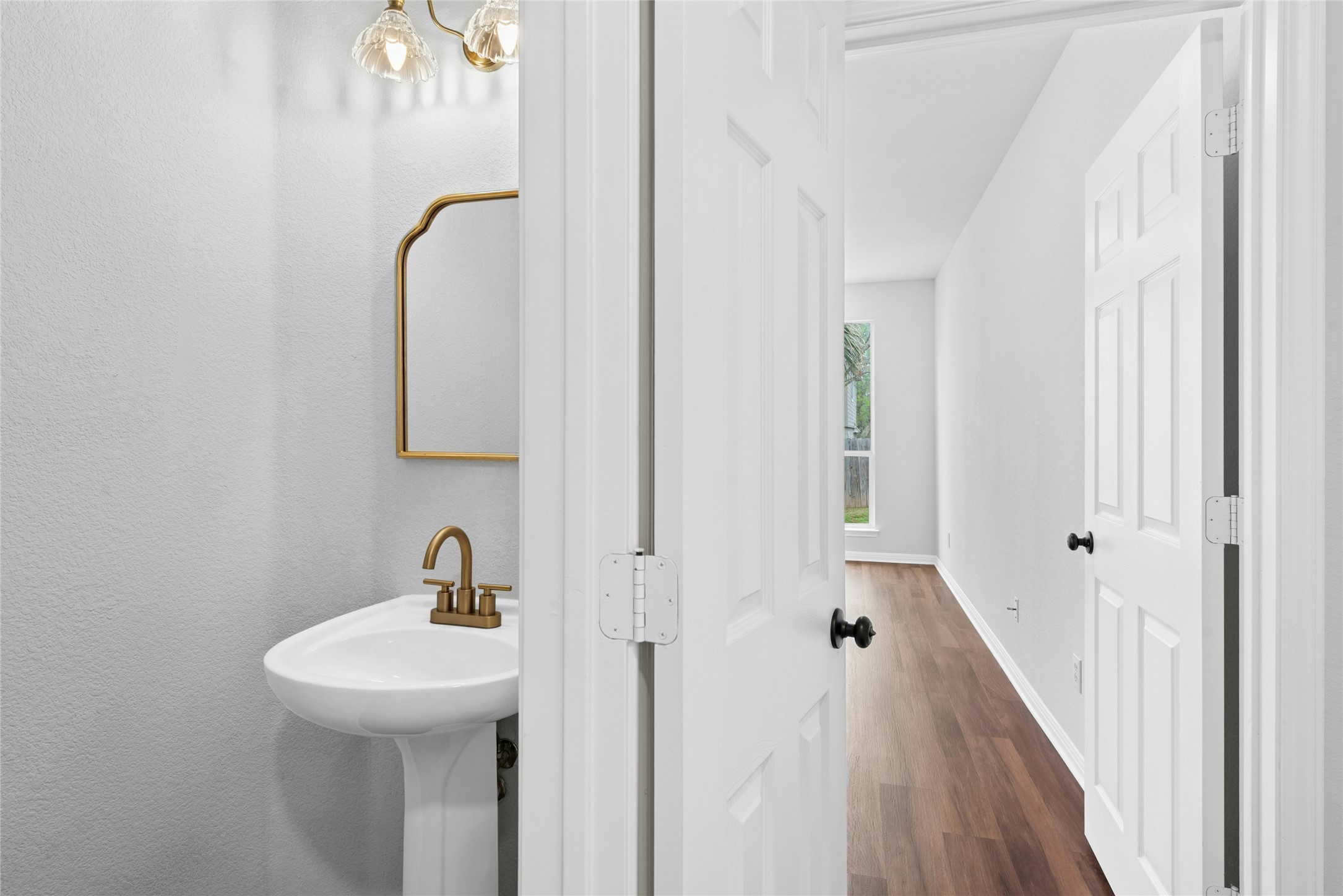 813 Caribou Ridge Trail Pflugerville, TX 78660 - Photo 30 of 39 a bathroom with a sink and mirror