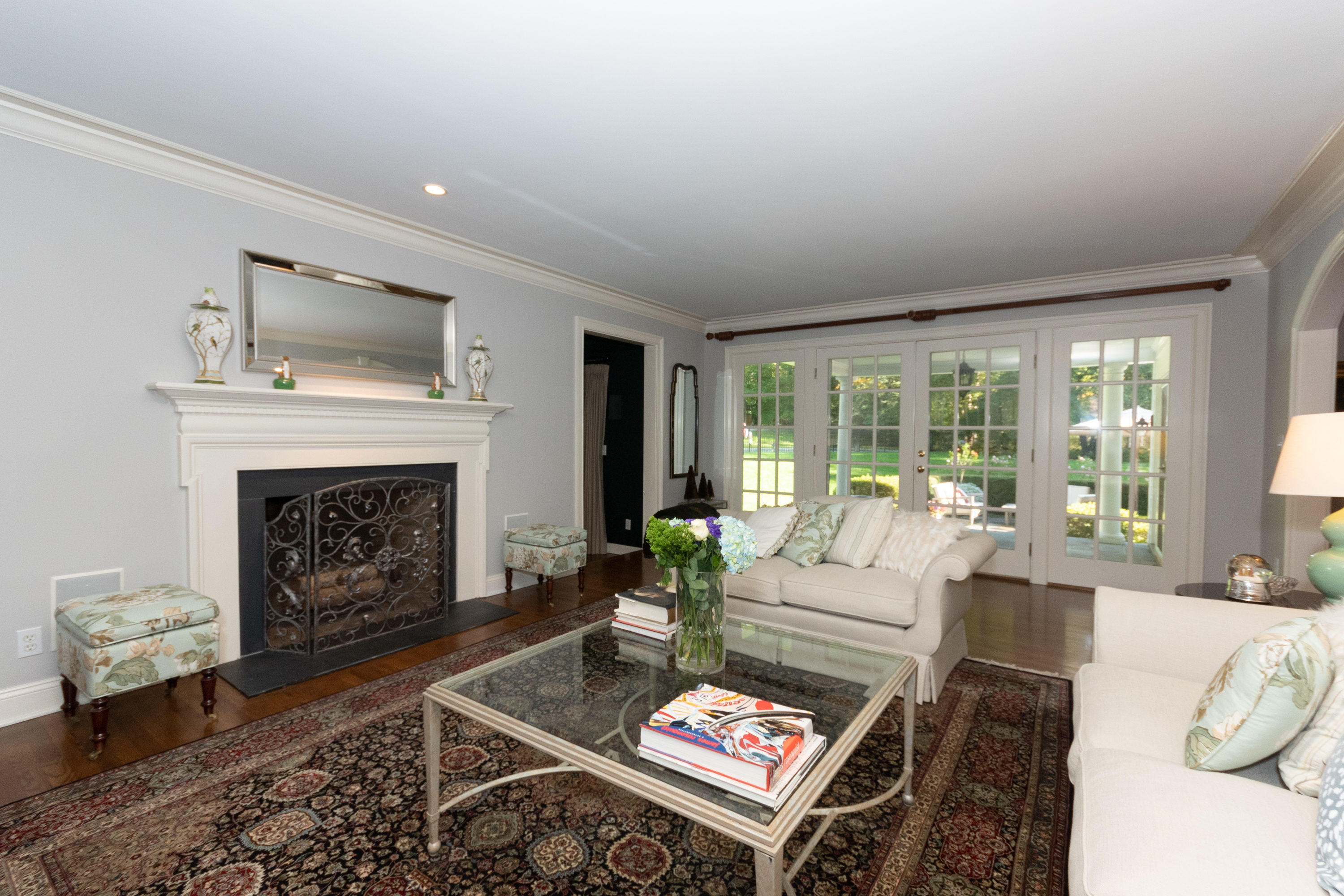 16 Shagbark Road Darien, CT 06820 - Photo 11 of 55 a living room with furniture and a fireplace