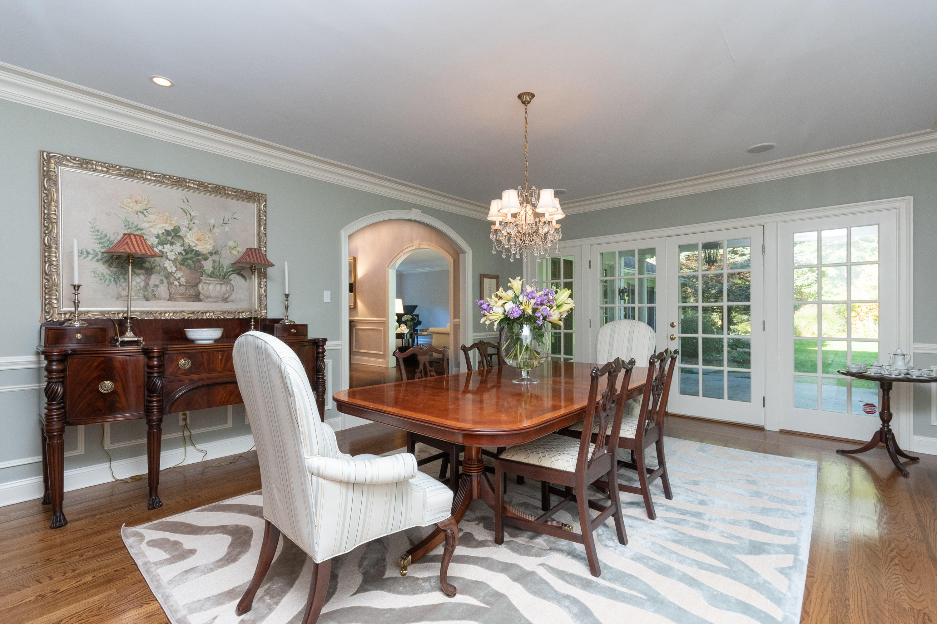 16 Shagbark Road Darien, CT 06820 - Photo 12 of 55 a view of a dining room with furniture window and wooden floor