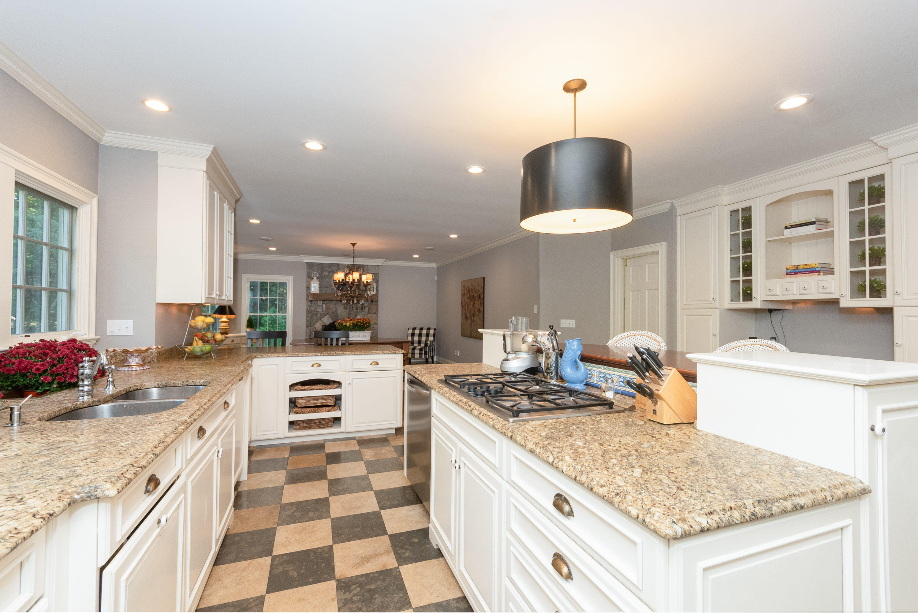 16 Shagbark Road Darien, CT 06820 - Photo 16 of 55 a kitchen with granite countertop kitchen island stainless steel appliances a sink stove and refrigerator