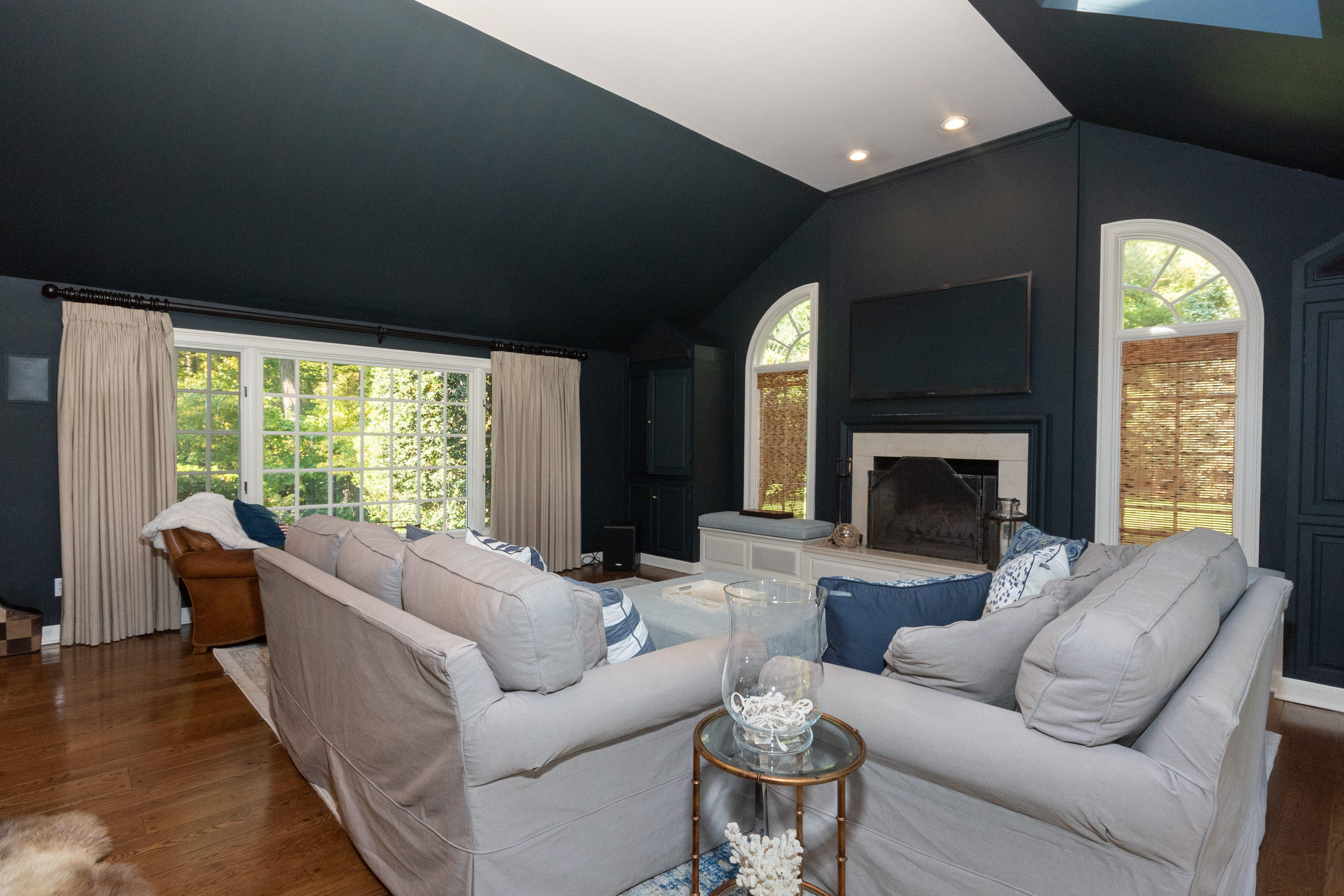 16 Shagbark Road Darien, CT 06820 - Photo 20 of 55 a living room with furniture and a fireplace
