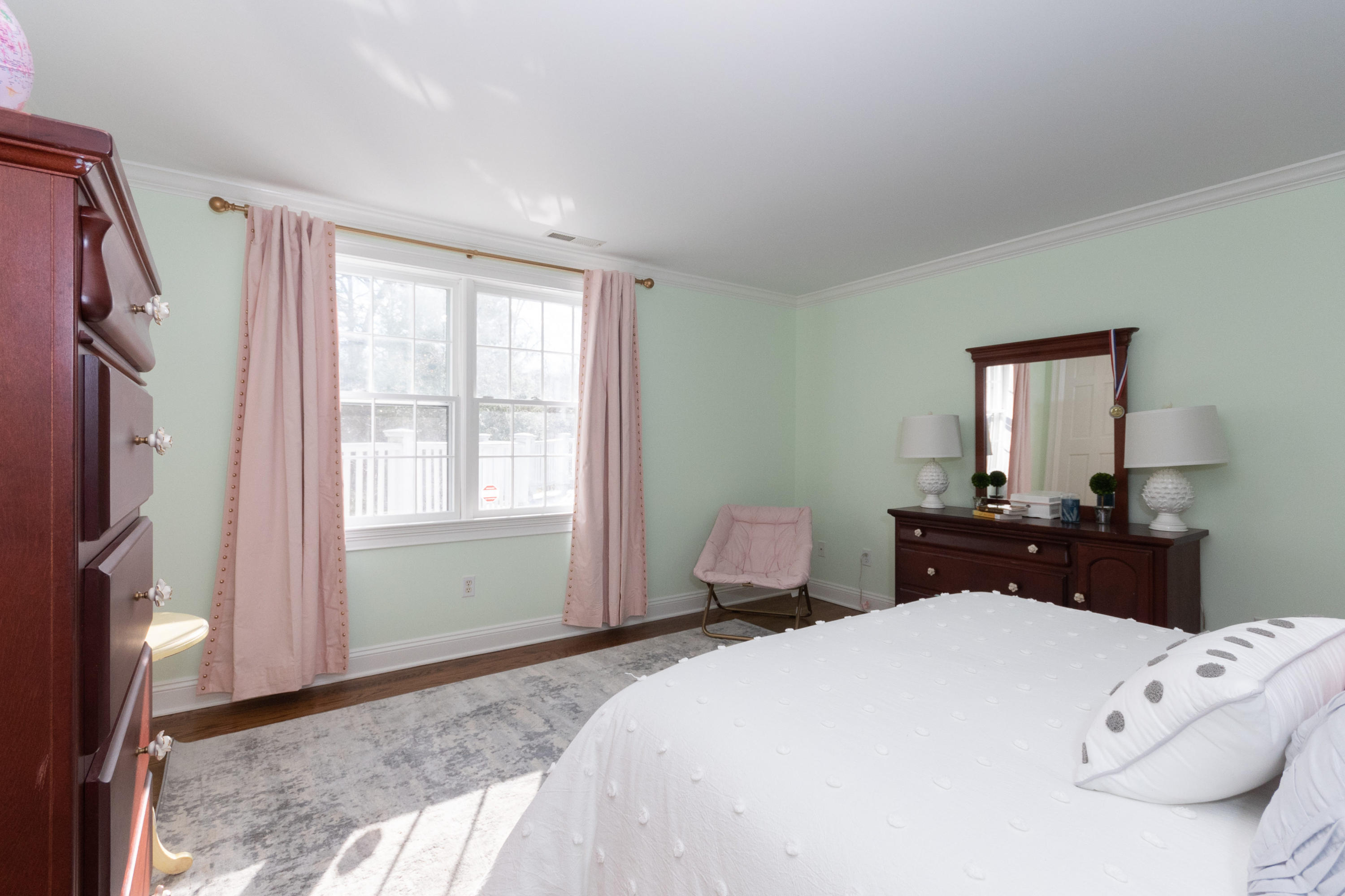 16 Shagbark Road Darien, CT 06820 - Photo 37 of 55 a bedroom with a bed dresser and a window