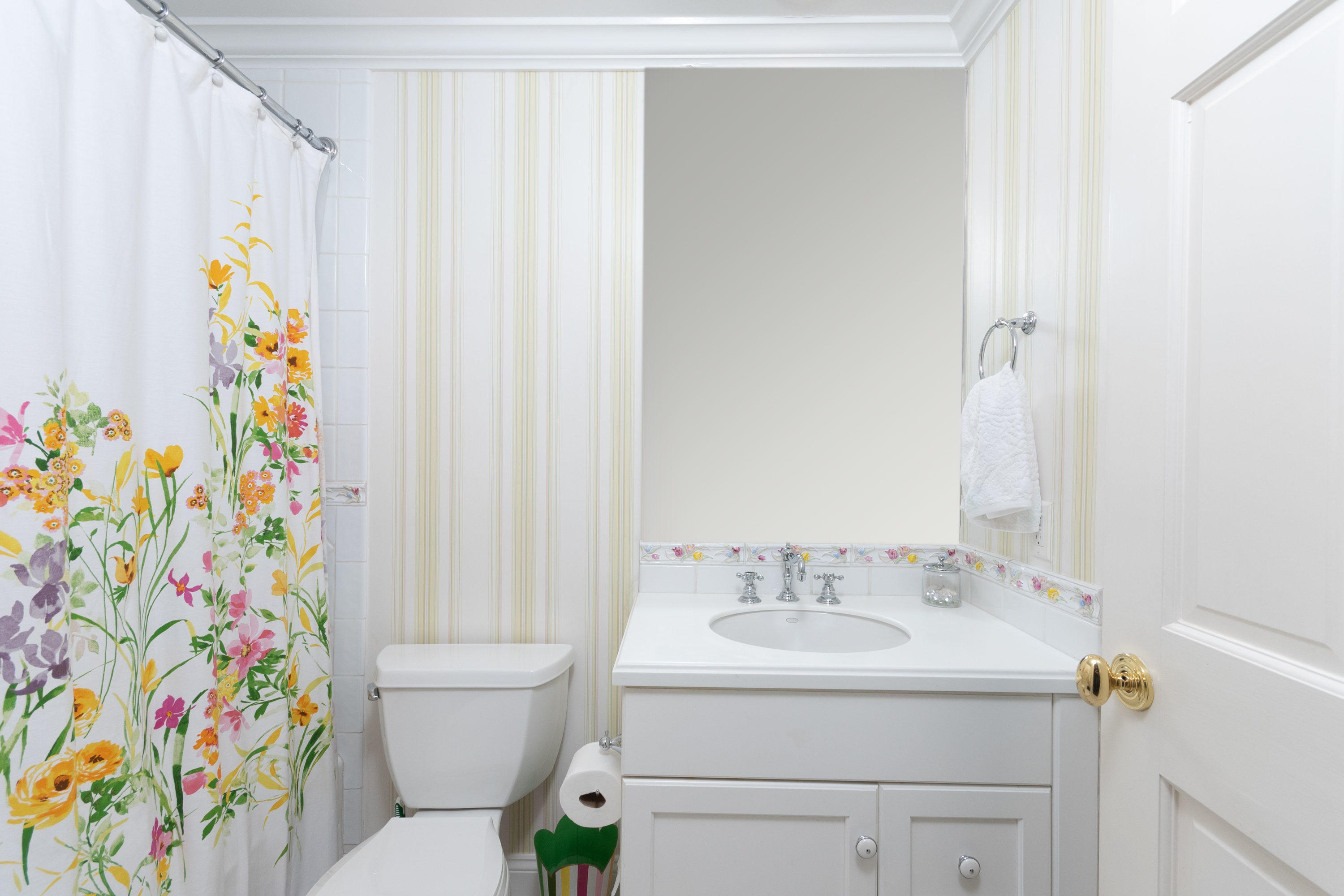 16 Shagbark Road Darien, CT 06820 - Photo 39 of 55 a bathroom with a sink toilet and shower curtain