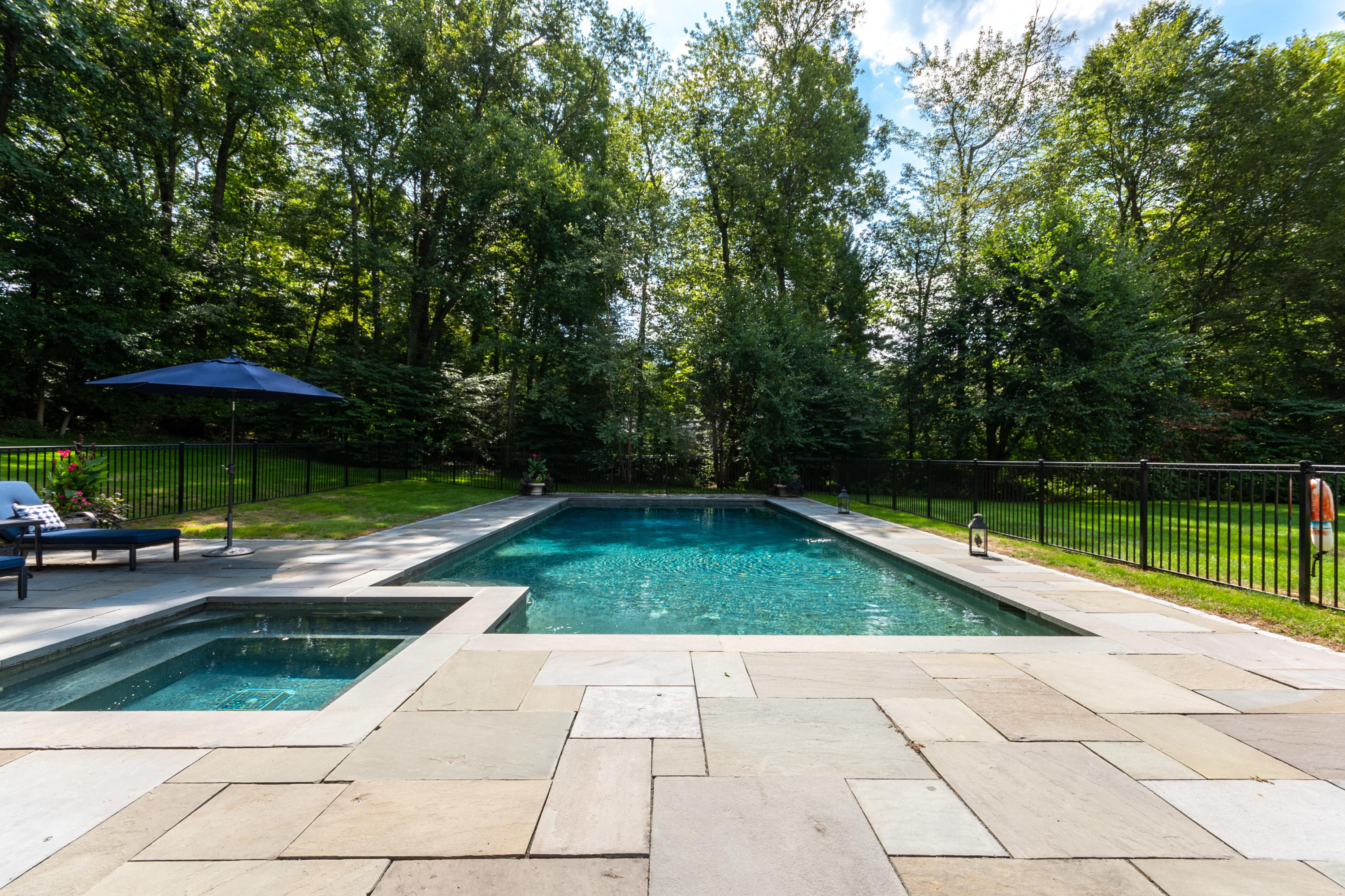 16 Shagbark Road Darien, CT 06820 - Photo 48 of 55 a view of backyard with swimming pool and seating space