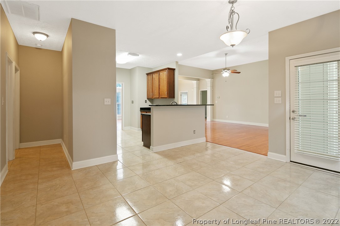 95 Crystal Point Sanford, NC 27332 - Photo 9 of 33 a view of a kitchen with a sink and a refrigerator