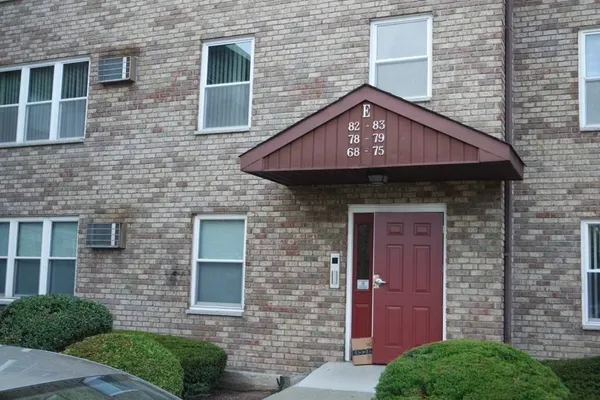 a front view of a house with yard