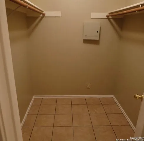 a bathroom with a toilet and shower