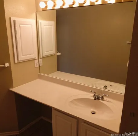 a bathroom with a shower and a toilet