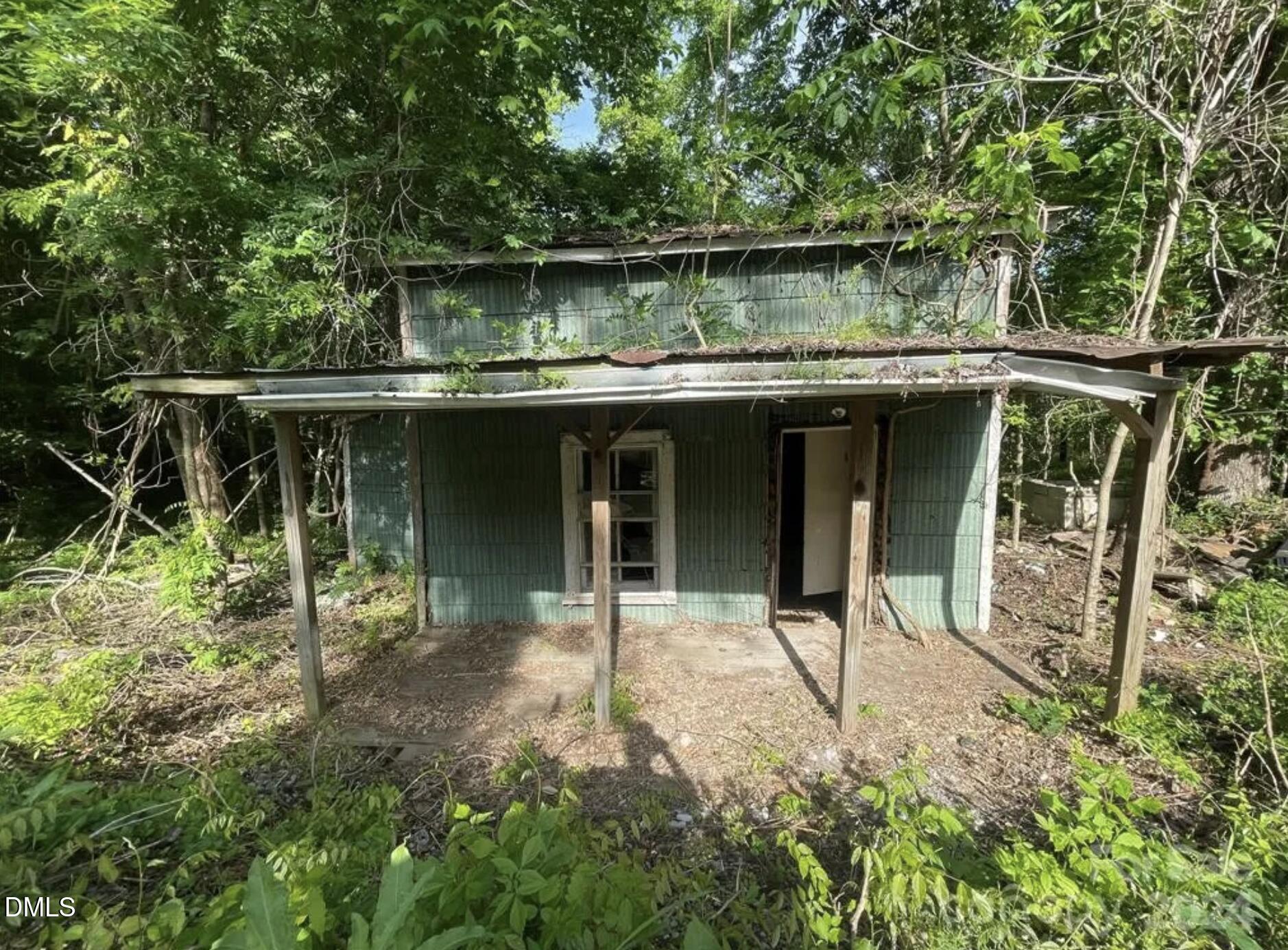 0 Sloan Road Roxboro, NC 27574 - Photo 11 of 11 a backyard with table and chairs