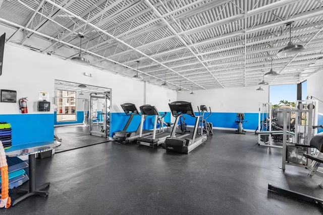 a view of a room with gym equipment