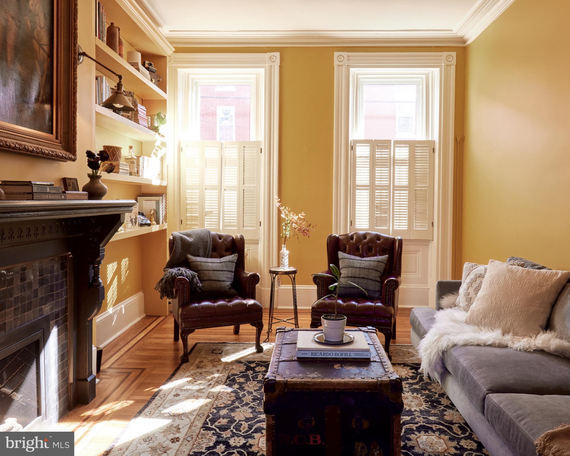 978 North 5th Street Philadelphia, PA 19123 - Photo 12 of 36 a living room with furniture and a floor to ceiling window