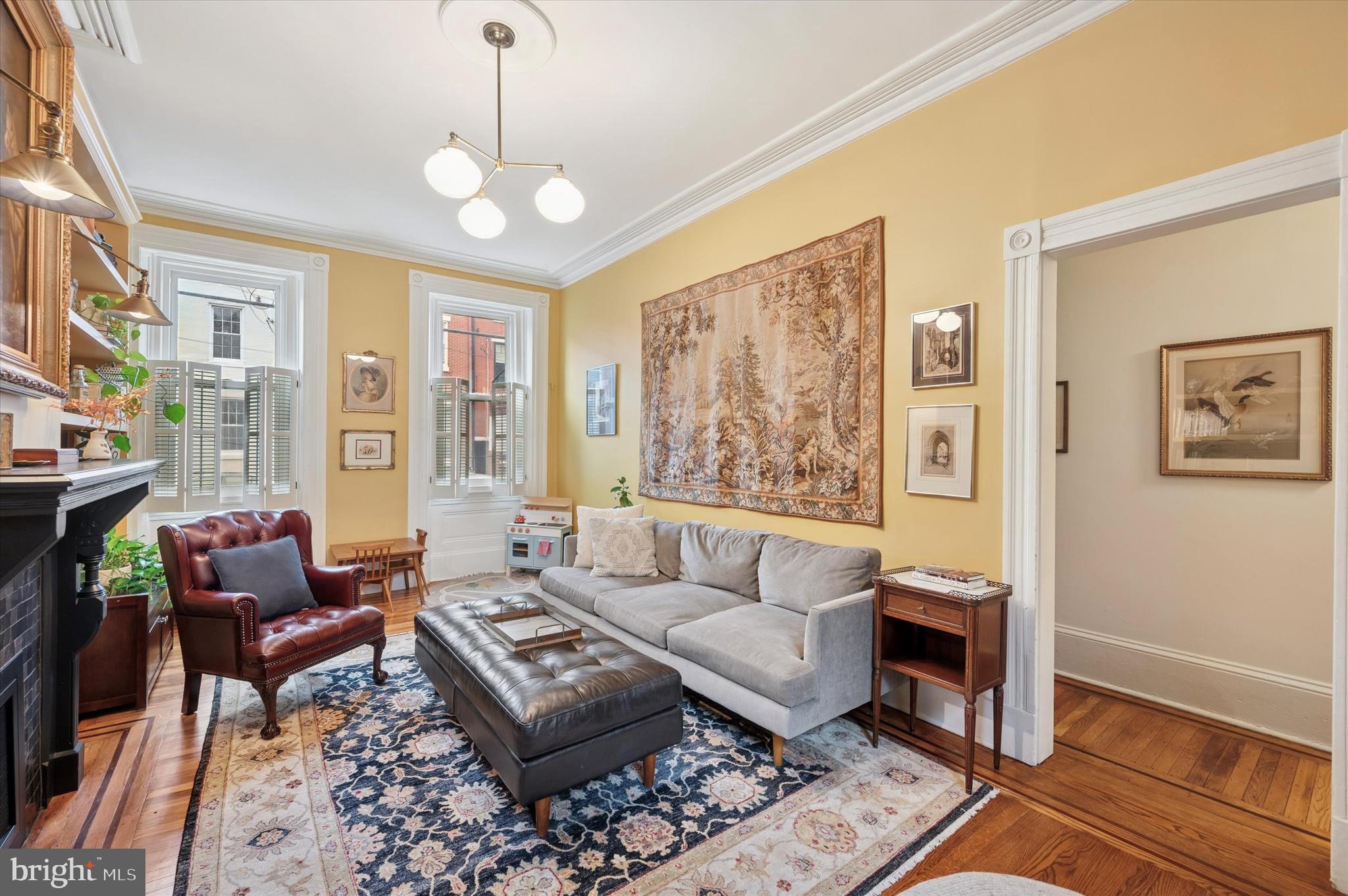 978 North 5th Street Philadelphia, PA 19123 - Photo 13 of 36 a living room with furniture and a large window