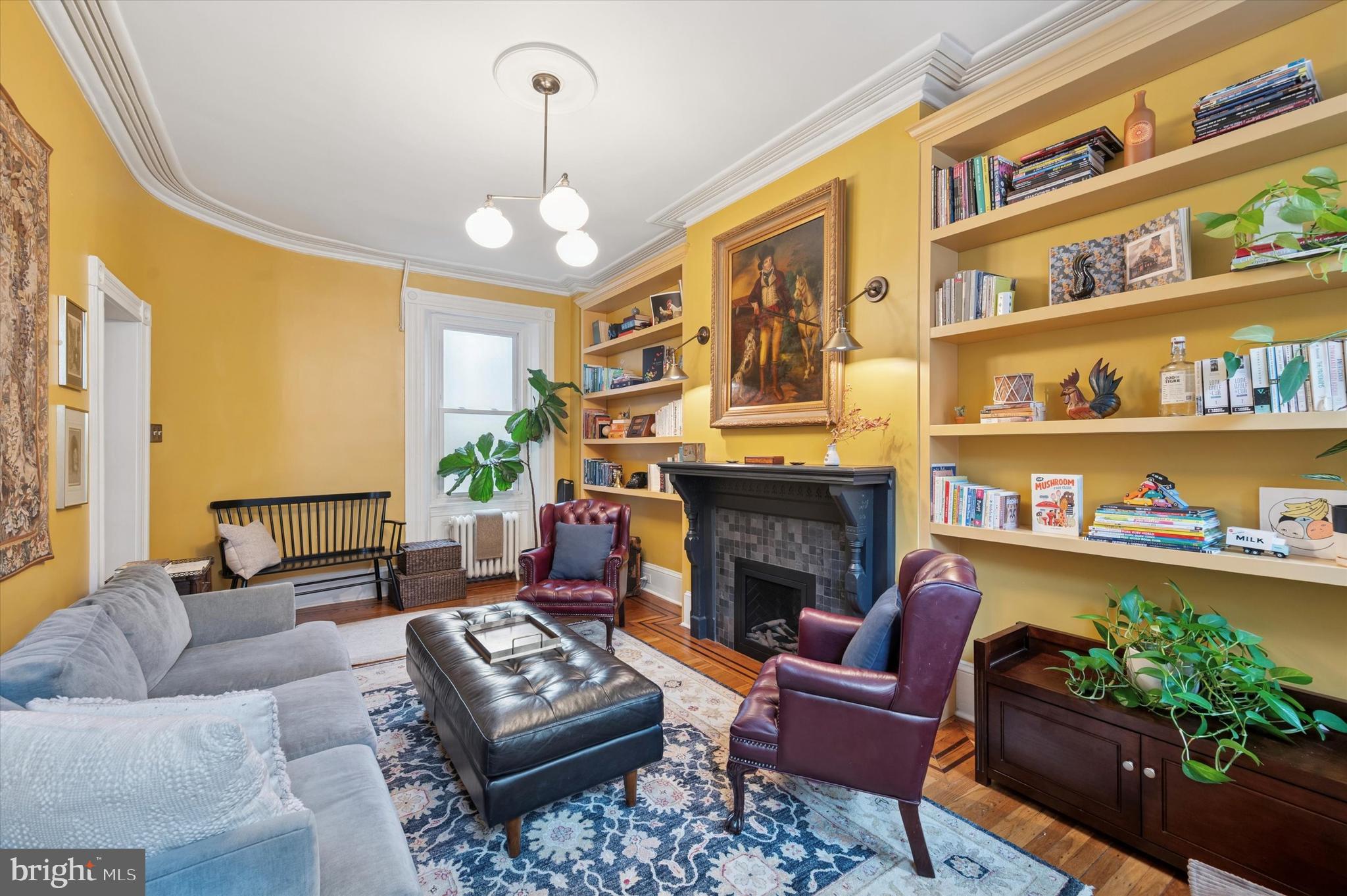 978 North 5th Street Philadelphia, PA 19123 - Photo 14 of 36 a living room with furniture and a fireplace