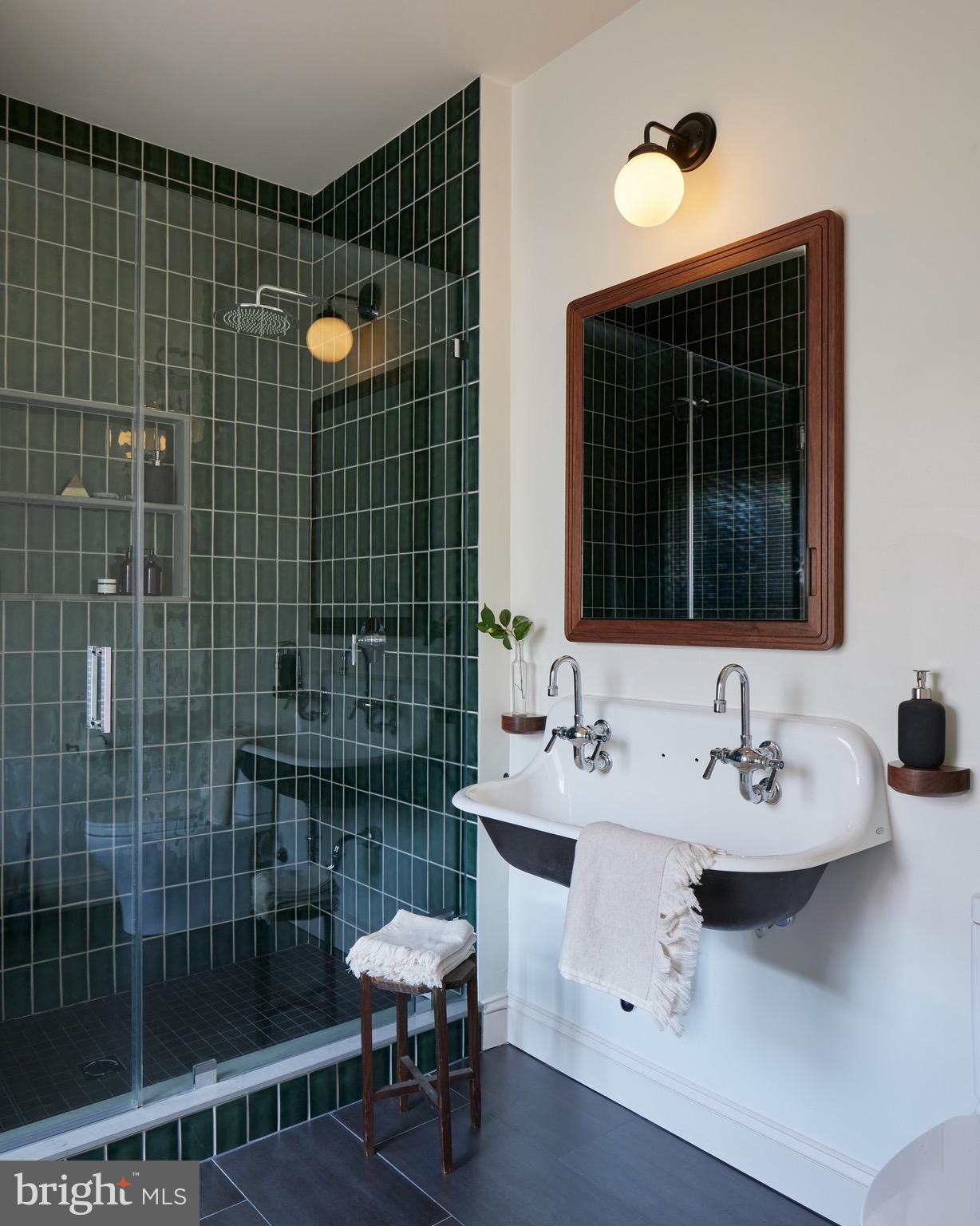978 North 5th Street Philadelphia, PA 19123 - Photo 22 of 36 a bathroom with a sink a toilet and shower