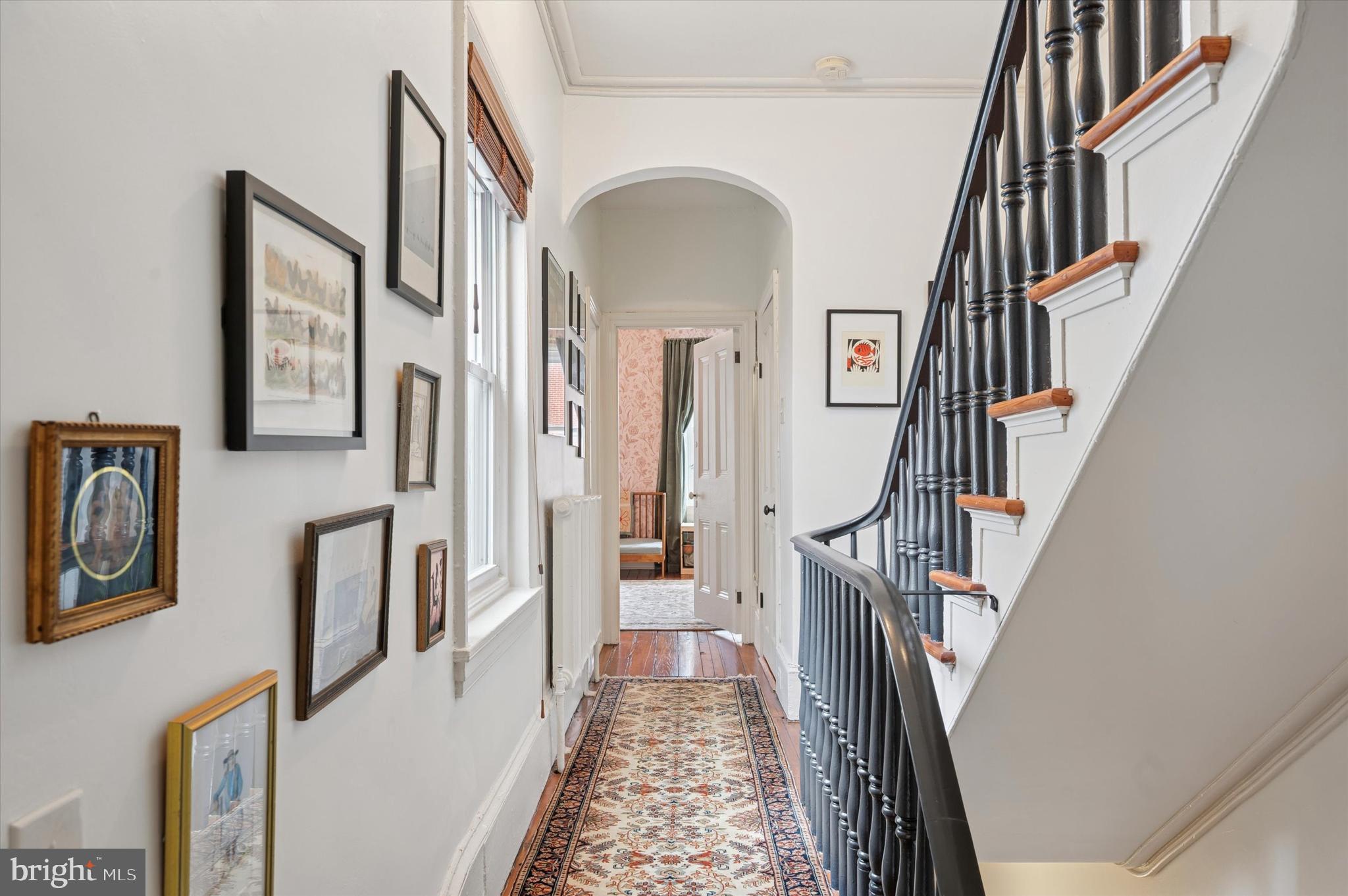 978 North 5th Street Philadelphia, PA 19123 - Photo 24 of 36 a view of a hallway with windows and stairs