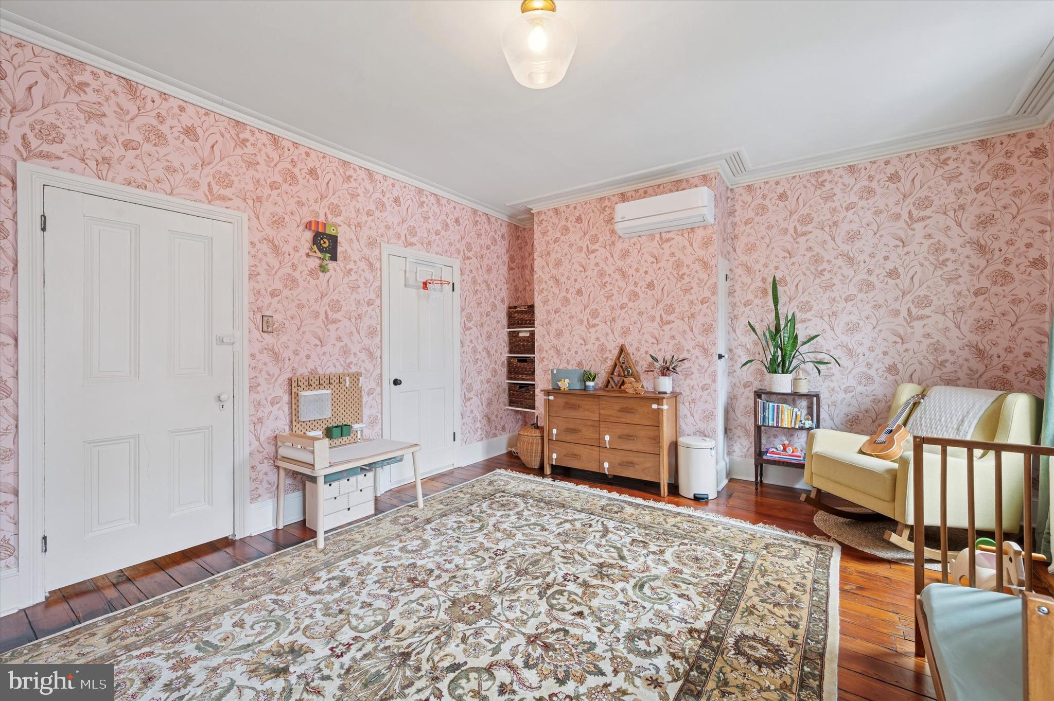 978 North 5th Street Philadelphia, PA 19123 - Photo 25 of 36 a bedroom with furniture and a wooden floor