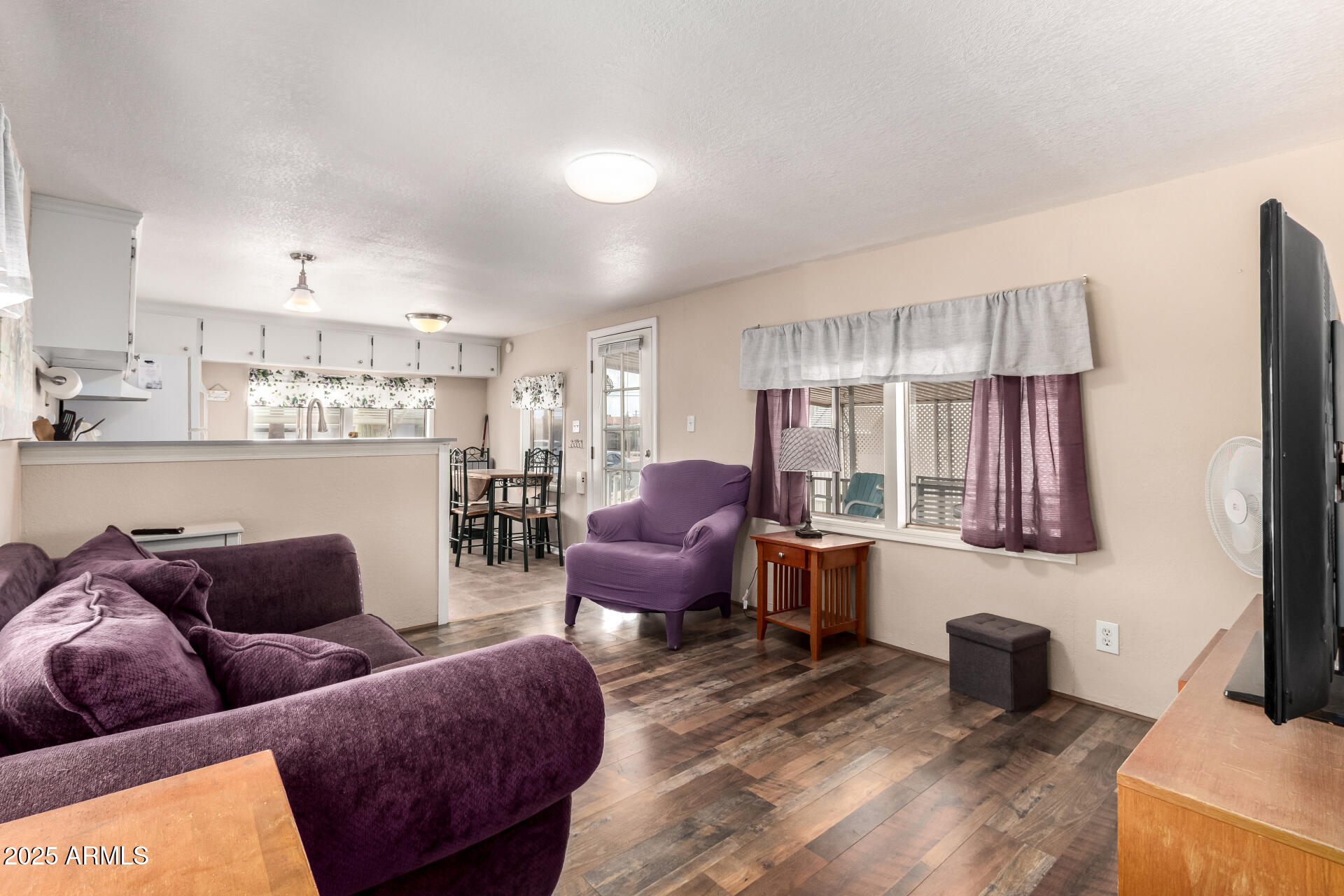 800 West Apache Trail, Unit 24 Apache Junction, AZ 85120 - Photo 11 of 27 a living room with furniture and a window