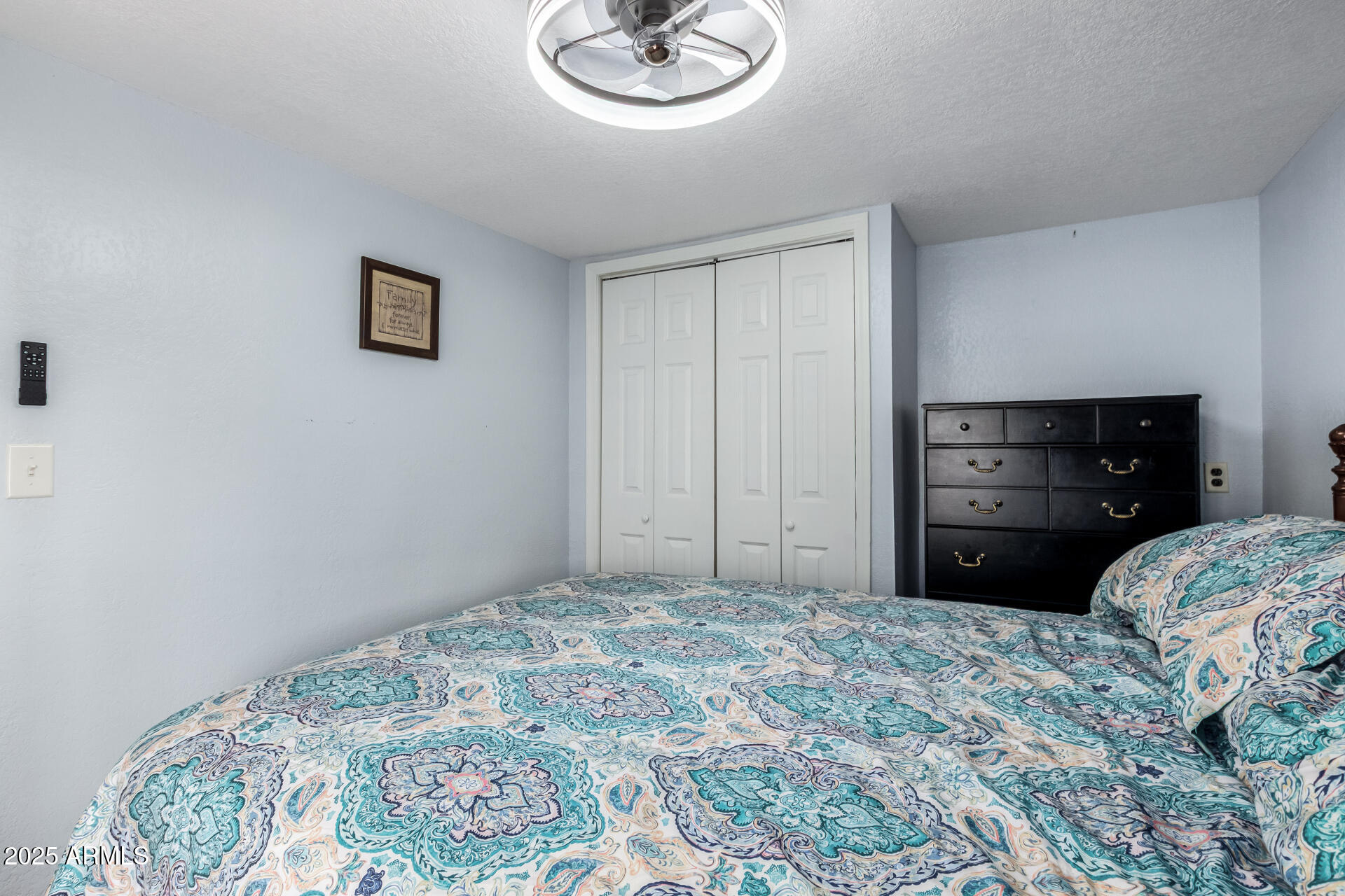 800 West Apache Trail, Unit 24 Apache Junction, AZ 85120 - Photo 18 of 27 a bedroom with a bed and a dresser