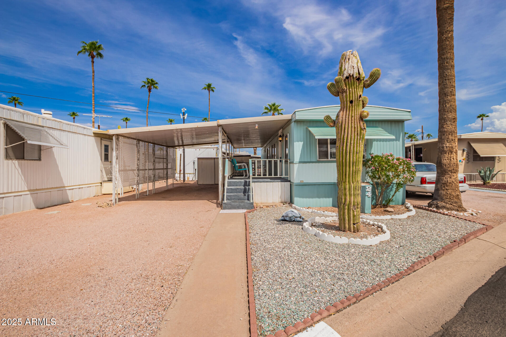 800 West Apache Trail, Unit 24 Apache Junction, AZ 85120 - Photo 2 of 27 a view of a hall with a fountain