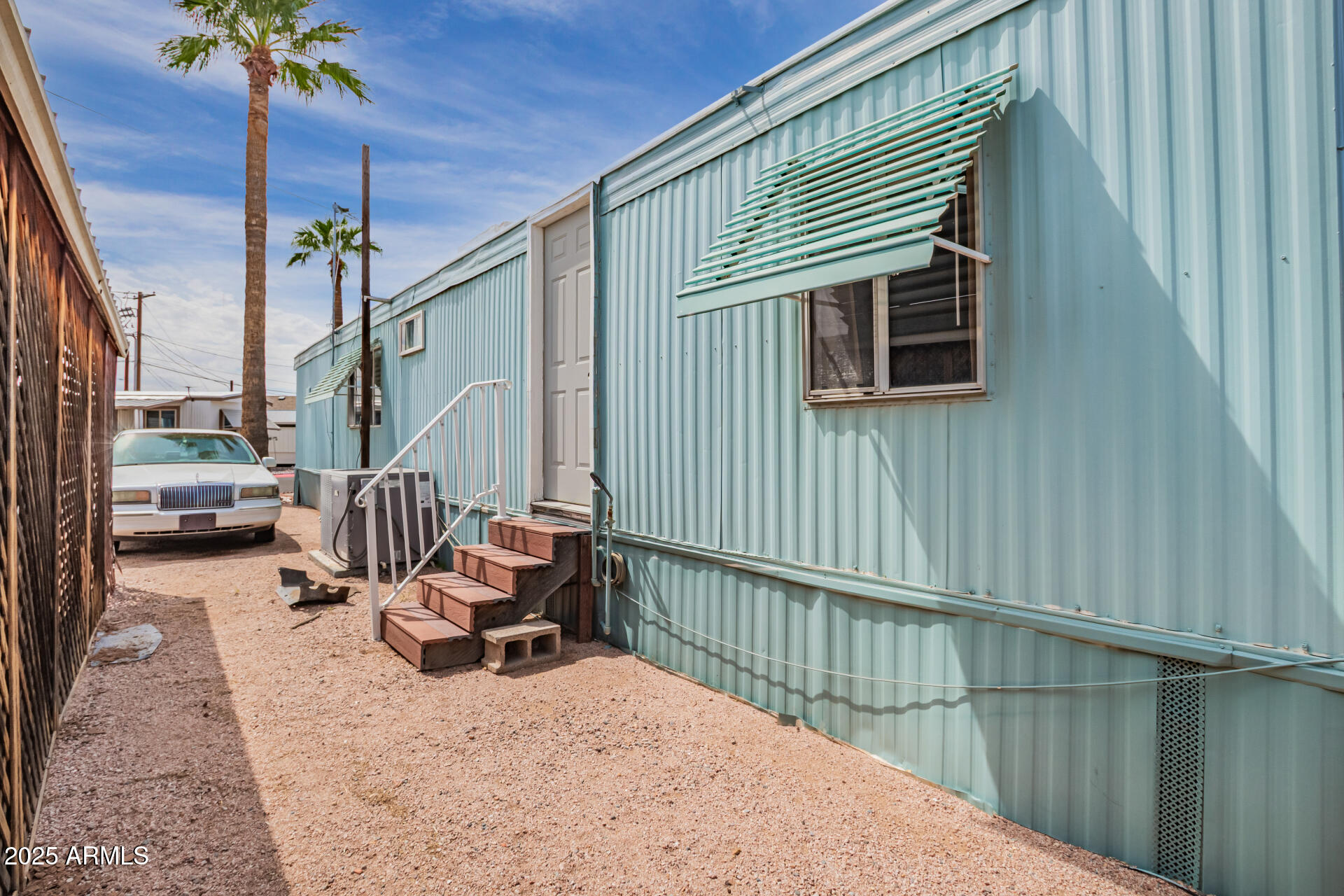 800 West Apache Trail, Unit 24 Apache Junction, AZ 85120 - Photo 26 of 27 a view of a balcony with chairs