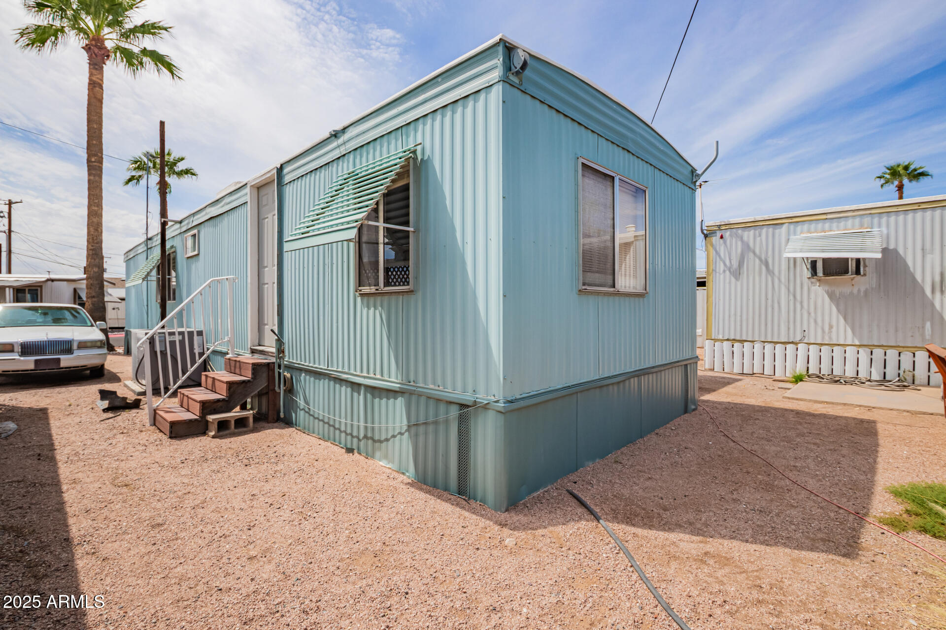 800 West Apache Trail, Unit 24 Apache Junction, AZ 85120 - Photo 27 of 27 a balcony with view of car parked