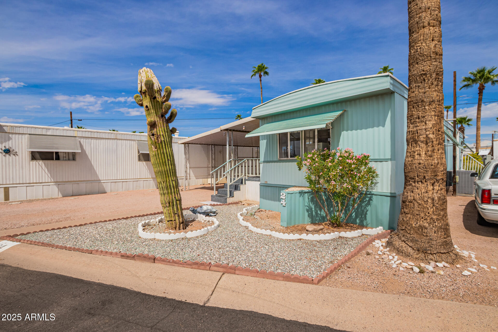 800 West Apache Trail, Unit 24 Apache Junction, AZ 85120 - Photo 4 of 27 a view of a house with sink and yard