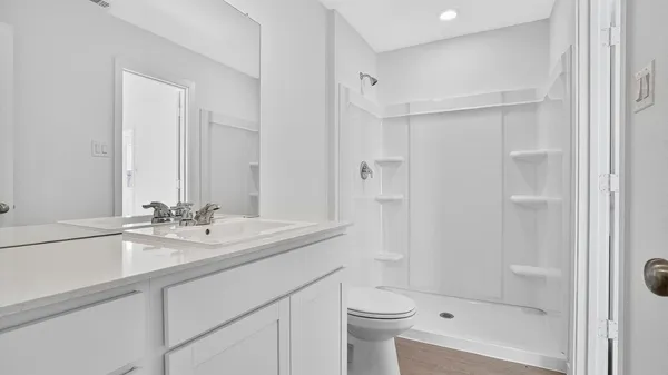 a view of a room with racks on the wall