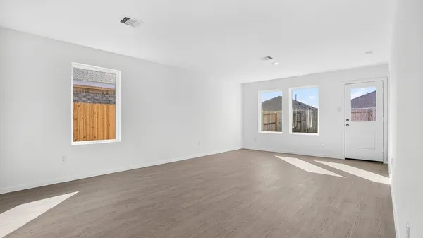 an empty room with windows