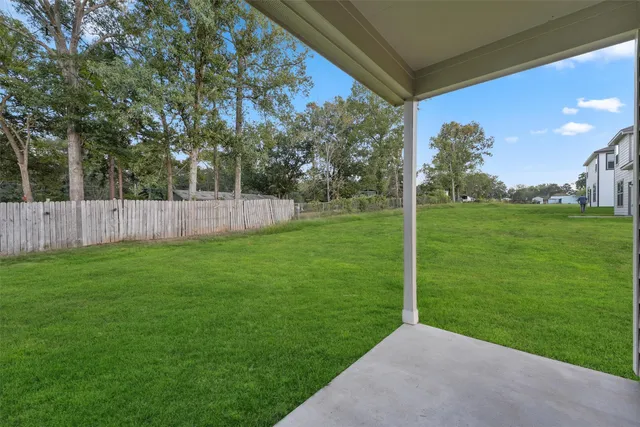 a view of a backyard with a garden