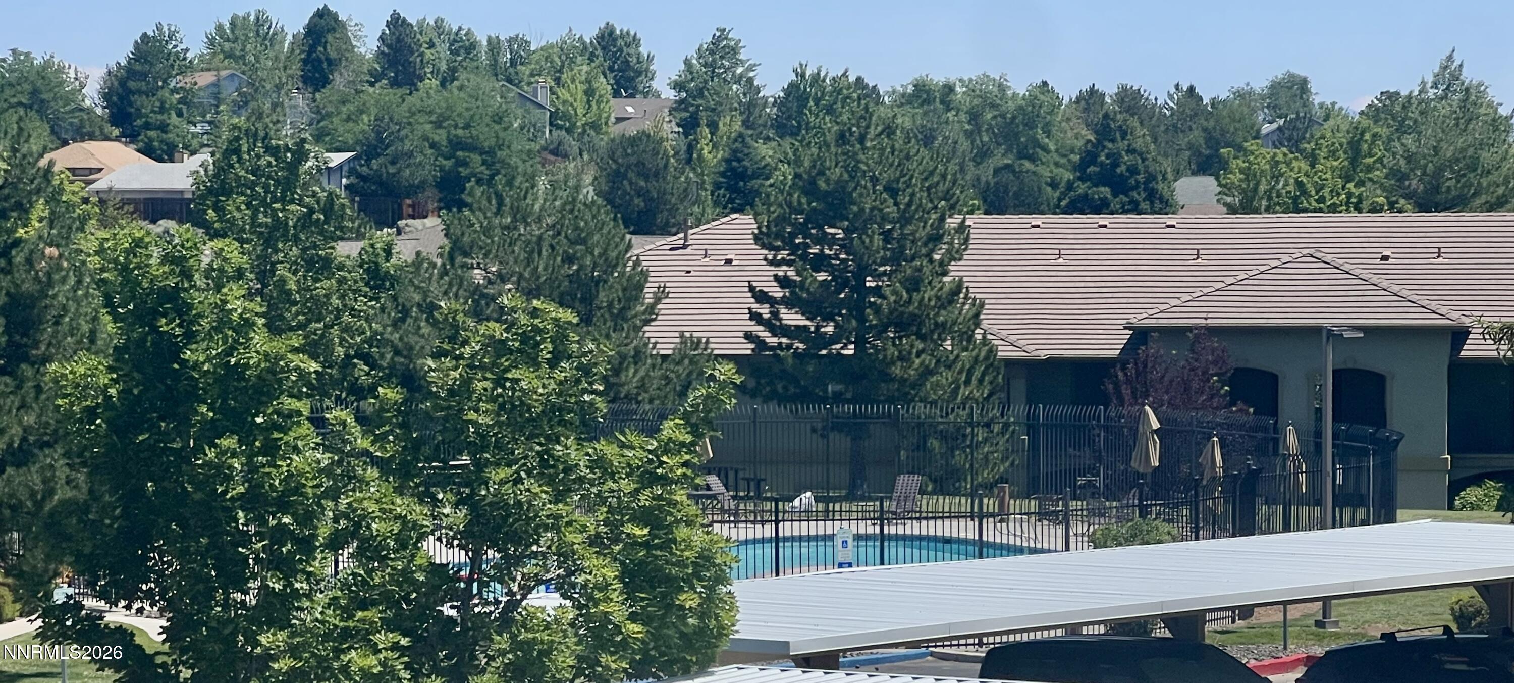 6850 Sharlands Avenue, Unit 2171 Reno, NV 89523 - Photo 18 of 36 Sharlands pool view 6-26