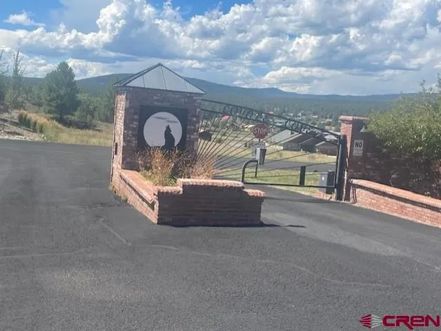 a view of a bench in front of a building