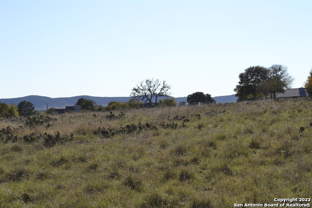Lt 22 Stone Crest Bandera, TX 78003 - Photo 2 of 9 a view of a large mountain with trees in the background