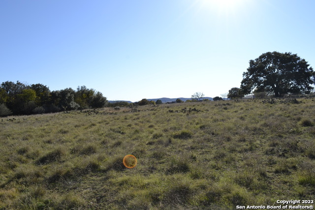Lt 22 Stone Crest Bandera, TX 78003 - Photo 7 of 9 a view of a dry yard with trees