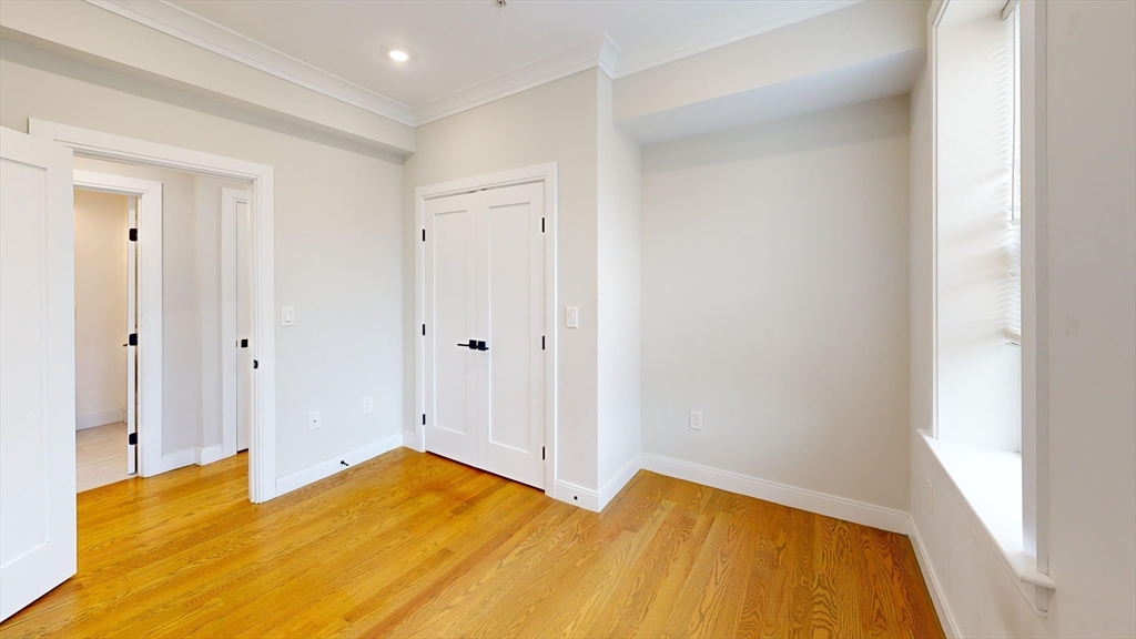 191 Porter Street, Unit 4 Boston, MA 02128 - Photo 6 of 8 a view of a bedroom