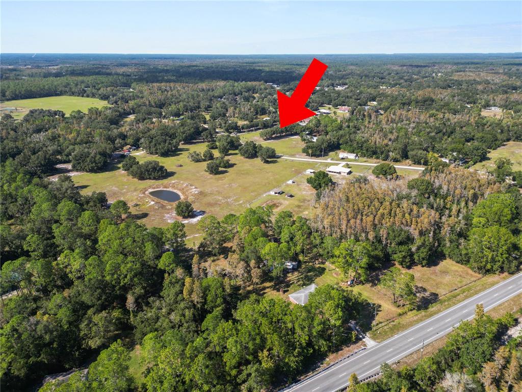 1828 Gator Creek Ranch Road Lakeland, FL 33809 - Photo 11 of 27 an aerial view of residential houses with outdoor space and trees
