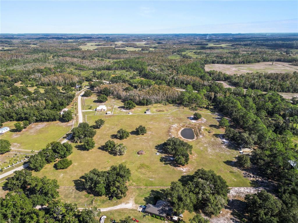 1828 Gator Creek Ranch Road Lakeland, FL 33809 - Photo 15 of 27 an aerial view of ocean beach and residential houses