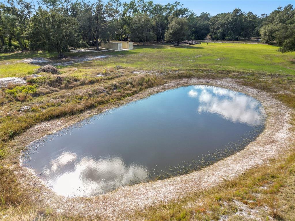 1828 Gator Creek Ranch Road Lakeland, FL 33809 - Photo 21 of 27 a view of a swimming pool with a yard