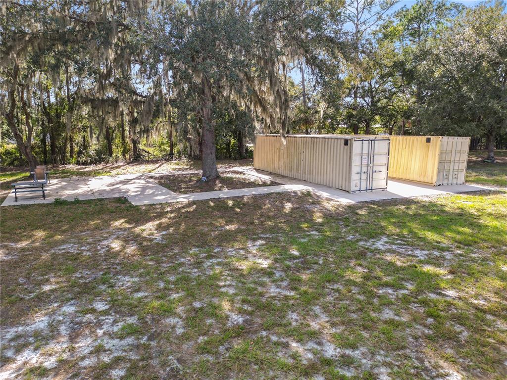 1828 Gator Creek Ranch Road Lakeland, FL 33809 - Photo 22 of 27 a view of a yard with a tree
