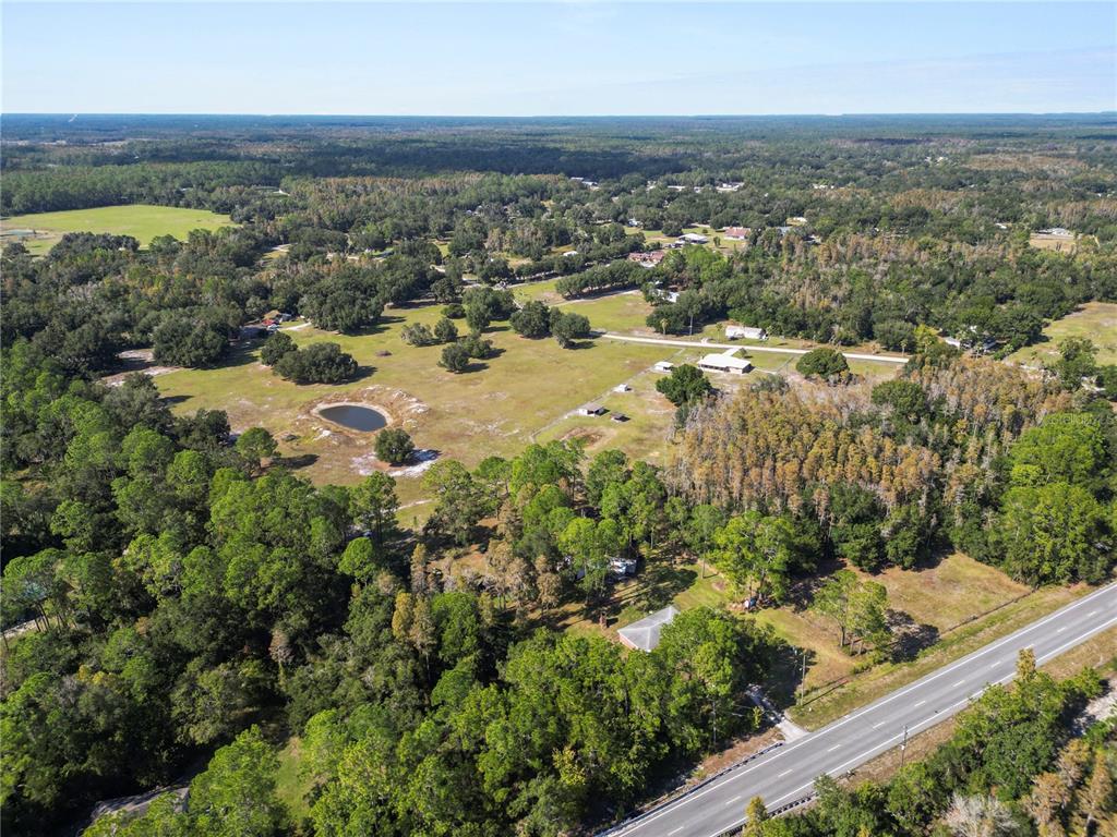 1828 Gator Creek Ranch Road Lakeland, FL 33809 - Photo 10 of 27 an aerial view of residential houses with outdoor space and trees