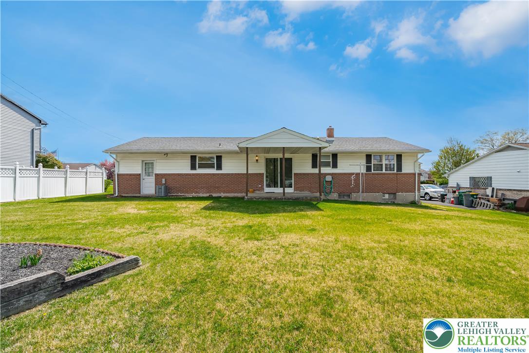 2141 Aster Road Lower Macungie Township, PA 18062 - Photo 11 of 62 a view of a house with a swimming pool
