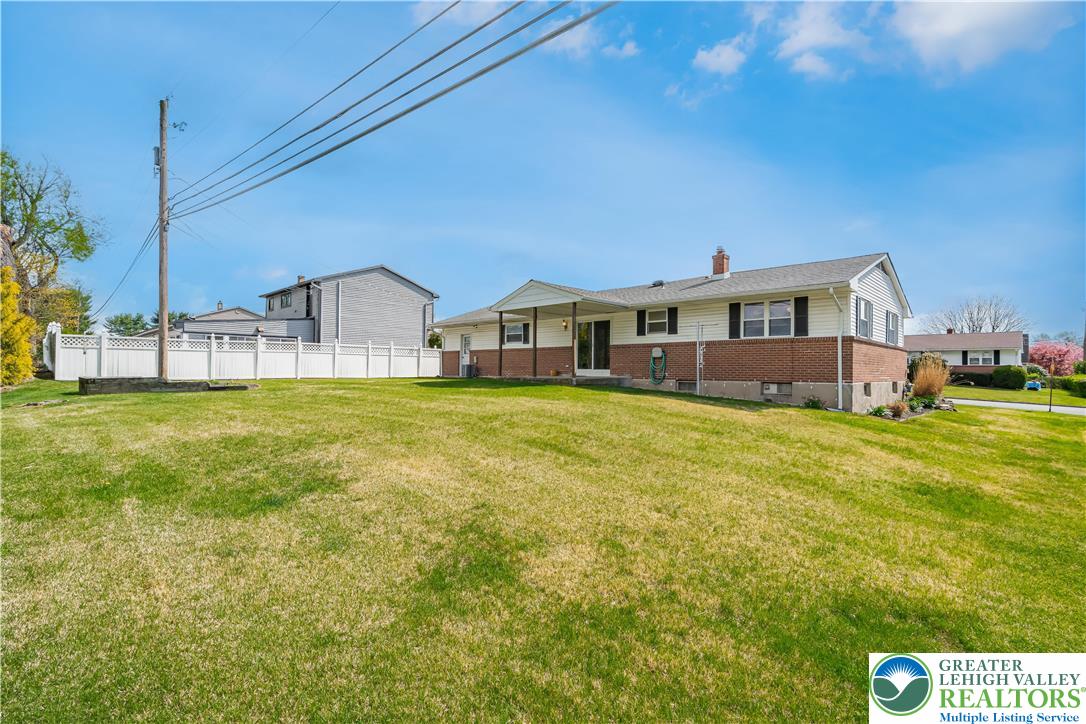 2141 Aster Road Lower Macungie Township, PA 18062 - Photo 12 of 62 a view of a house with a big yard