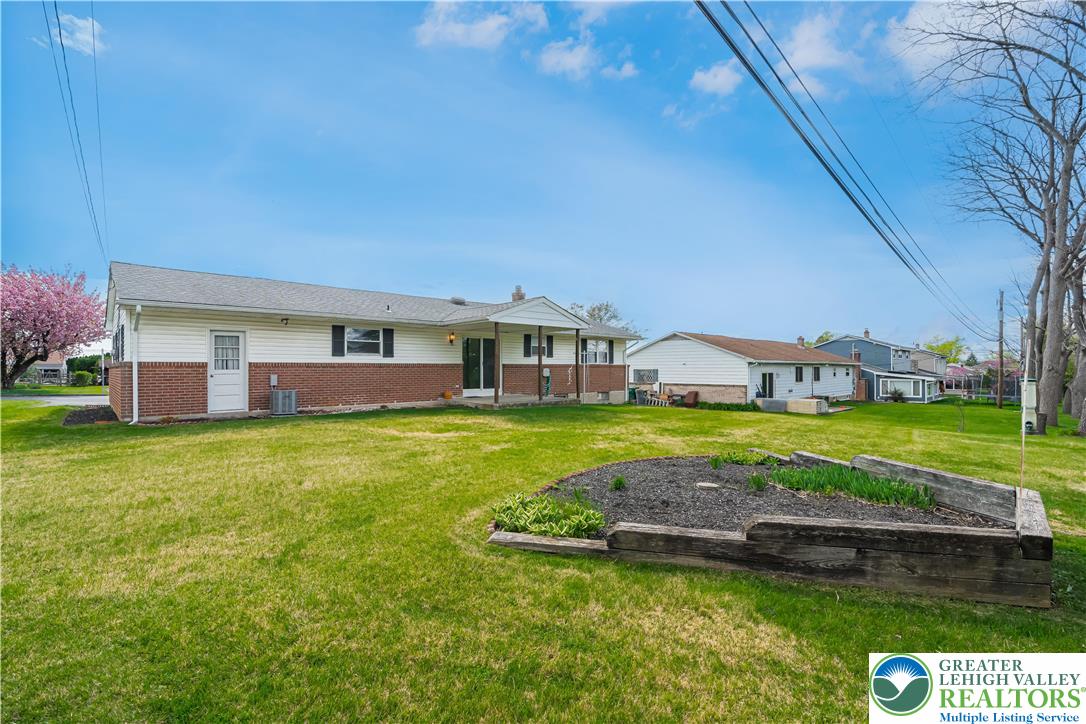 2141 Aster Road Lower Macungie Township, PA 18062 - Photo 14 of 62 a aerial view of a house with a big yard