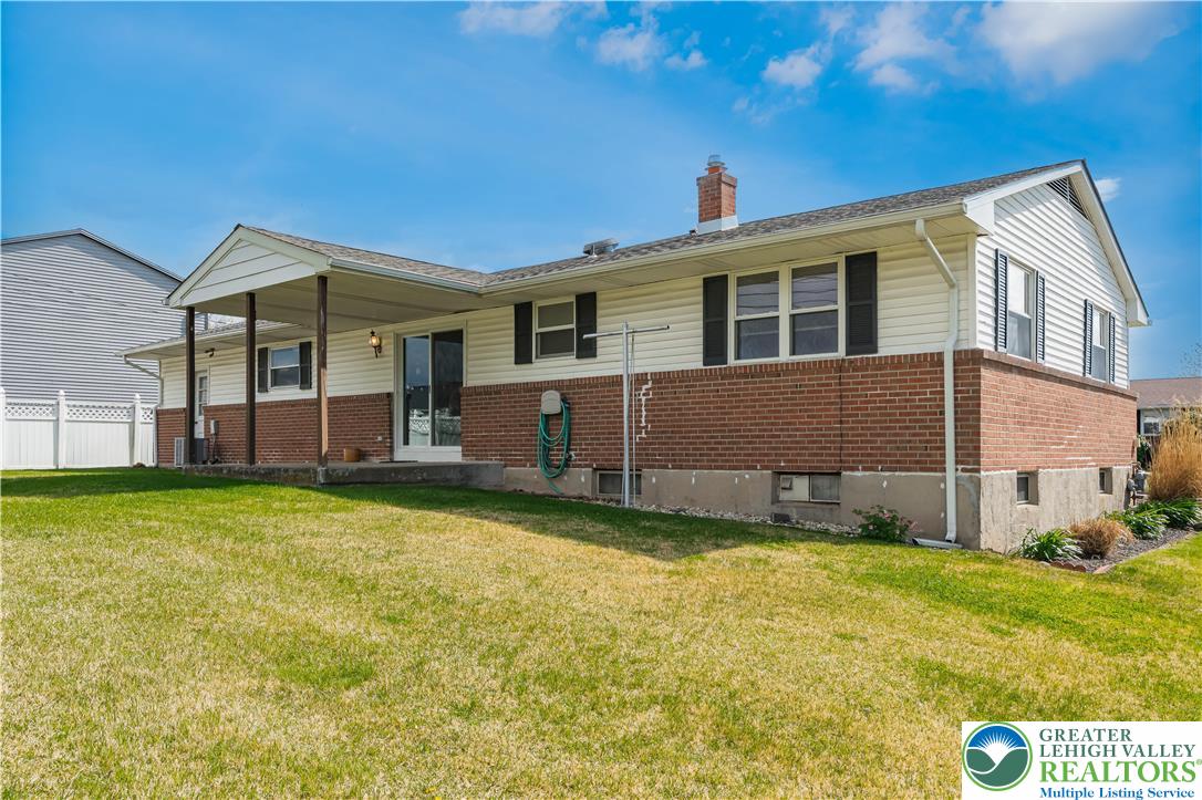 2141 Aster Road Lower Macungie Township, PA 18062 - Photo 15 of 62 a view of a house with a backyard