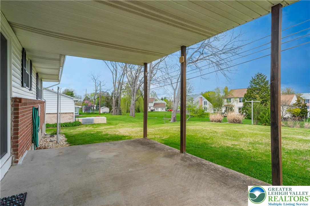2141 Aster Road Lower Macungie Township, PA 18062 - Photo 17 of 62 a view of a house with backyard and a garden